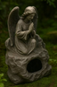 Angel Statue Hideout — Rock Base model, exact original-photo close-up