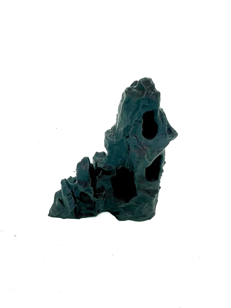 Cave Rock A — licensed designer photo; tall rock formation supplied unpainted in your chosen filament colour