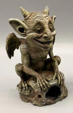 Piece 1: slim left gargoyle — exact crop from original licensed photo