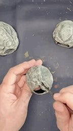 Grumpy Stone Caves — designer demonstrating hand painting; painting service not included