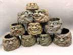 Stone planter family shown for inspiration; this listing includes one Grumpy Stone planter only