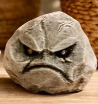 Grumpy Stones — Scowling model; exact crop of licensed original photograph