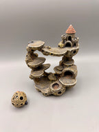 Moon Castle with removable comet displayed separately; painted example.