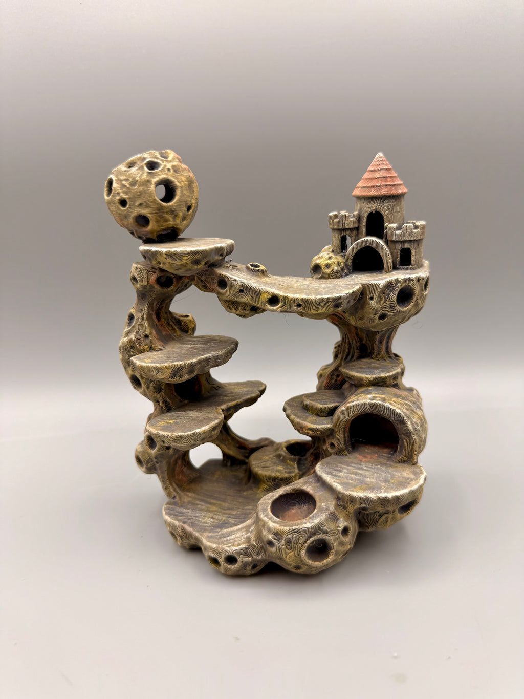 Moon Castle with castle, platforms, caves and removable comet. Painted example; standard orders ship unpainted in PETG.