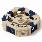 PawQuest optional lid personalization example: Mr. Whiskers in raised Dark Blue lettering, with Dark Blue lid accents, paw prints and gates, a beige base and plain beige front lid edge. Illustrative rendering.