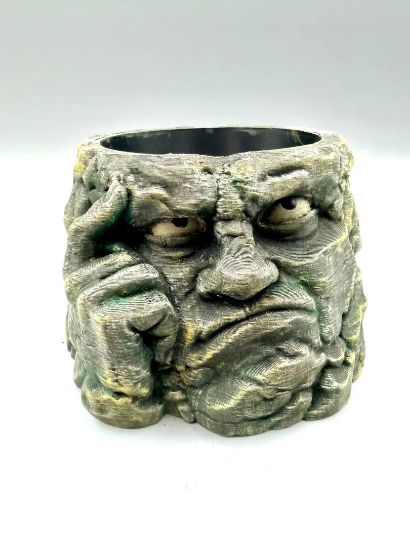 Thinking Stone Planter — hand-painted display example; supplied unpainted