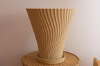 Rippled flower pot, snap-in drainage disc